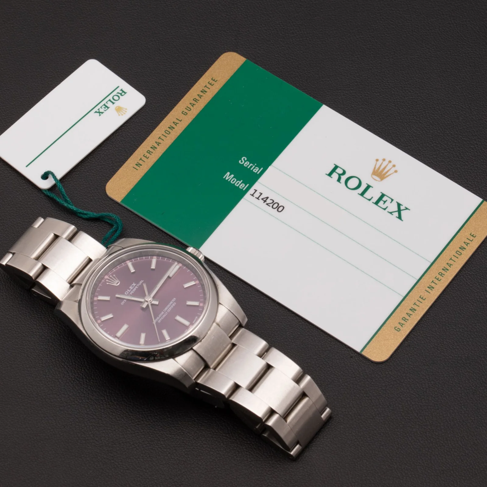 Rolex Oyster Perpetual 114200 Smooth Bezel Watch 34mm Red Grape Dial - Image 6